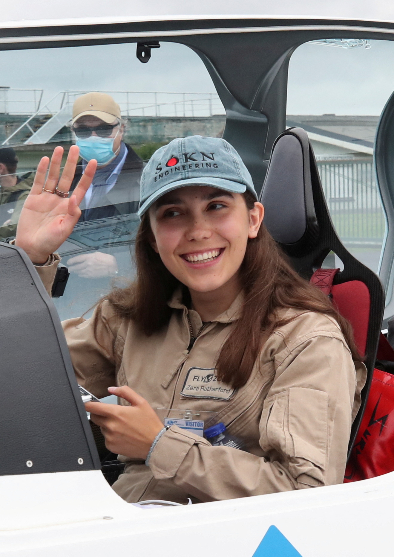 PHOTO: Belgian-British pilot Zara Rutherford, poses for pictures before departing for a round-the-world trip in a light aircraft, aiming to become the youngest female pilot to circle the planet alone, in Wevelgem, Belgium, Aug. 18, 2021. 