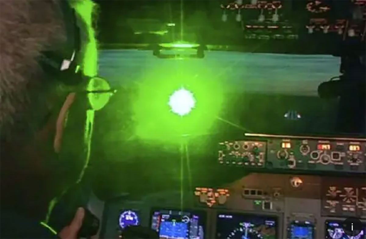 PHOTO: A simulation of a laser pointed toward the cockpit of a plane, shows the dangers of lasers to pilots, in a public service piece by the FBI.