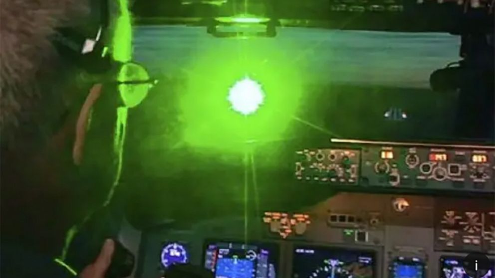 PHOTO: A simulation of a laser pointed toward the cockpit of a plane, shows the dangers of lasers to pilots, in a public service piece by the FBI.