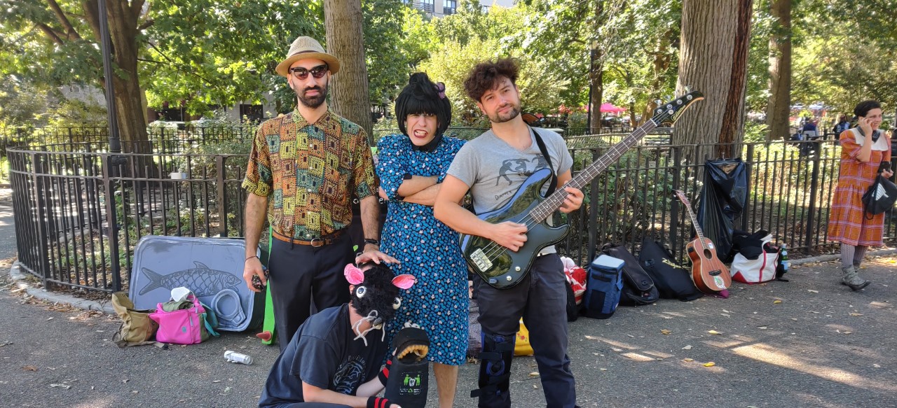 PHOTO: The Pinc Louds are comprised of Claudi Love, center, a singer and guitarist, alongside Raimundo Atal, left, on keyboard and Mark Mosterin, right on bass guitar. Jamie Emerson, bottom, a visual artist, performs alongside dressed as a rat.