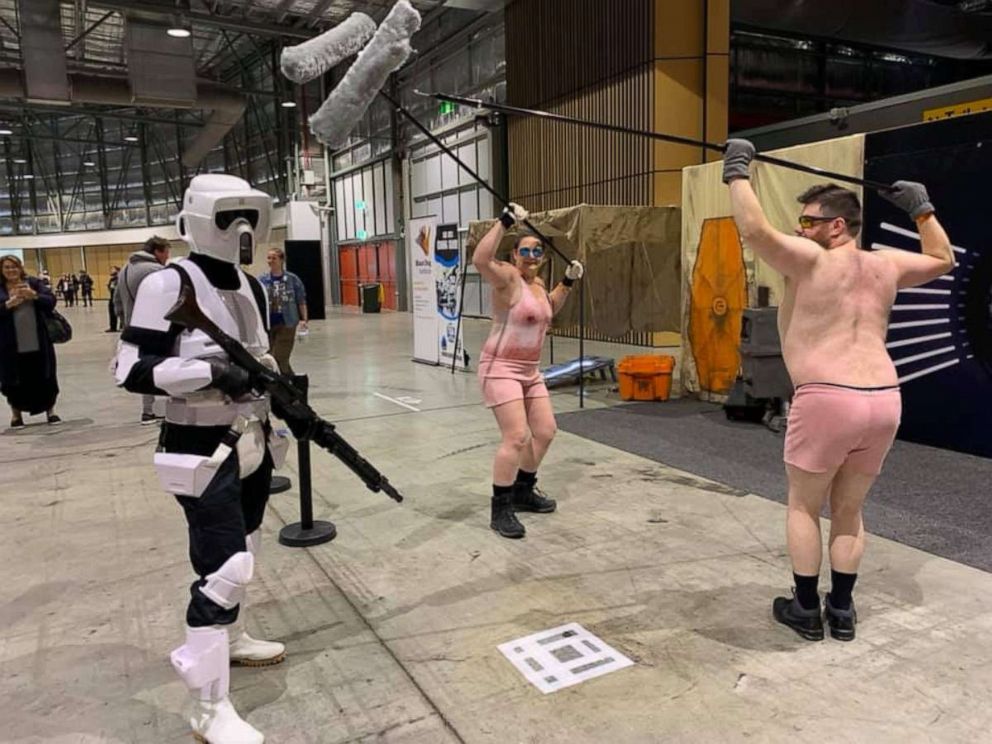 PHOTO: Australian cosplayer Deborah Eve, (center) poses with friend Lincoln Green (right) at the Sydney Supanova Comic Con in June.