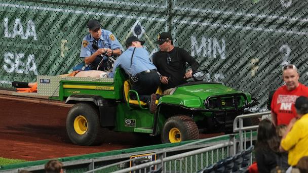 A fan is carted off the field at PNC Park after falling out of the stands during the seventh inning of a baseball game between the Pittsburgh Pirates and the Chicago Cubs in Pittsburgh, April 30, 2025. 