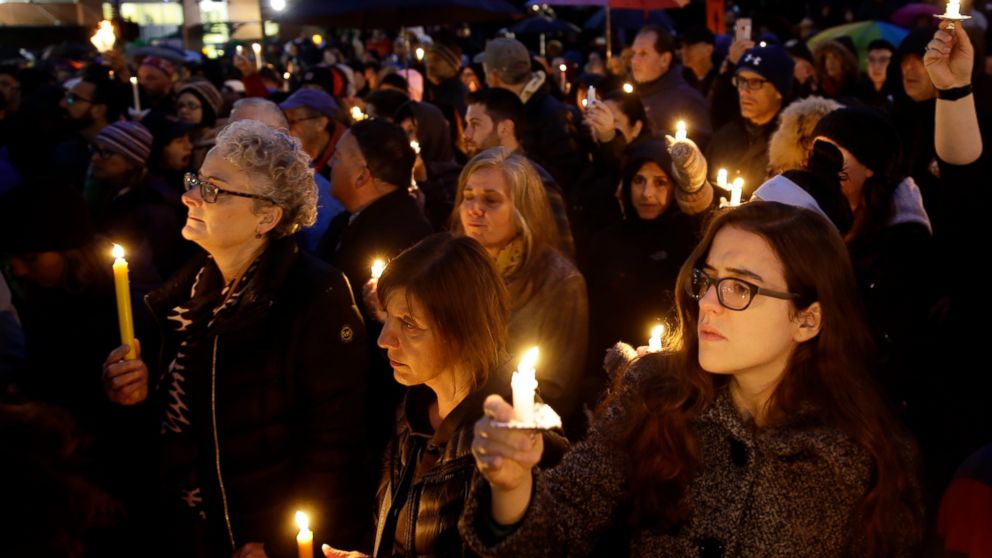 PHOTO: People hold candles as they gather for a vigil in the aftermath of a deadly shooting at the Tree of Life Congregation, in the Squirrel Hill neighborhood of Pittsburgh, Saturday, Oct. 27, 2018. 