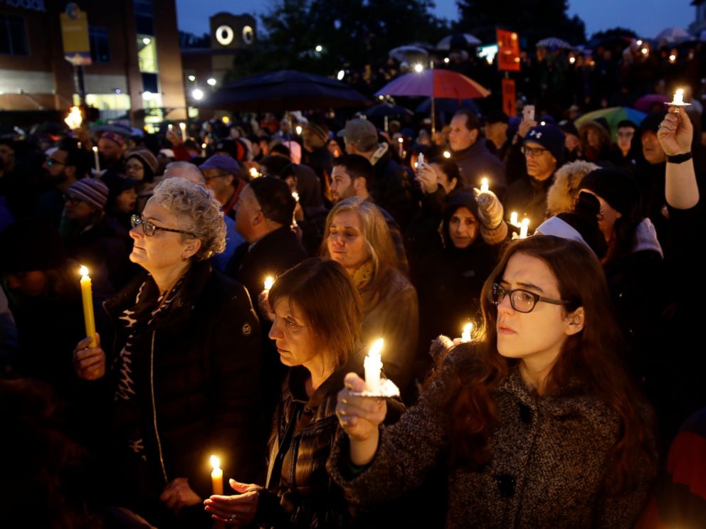 PHOTO: People hold candles as they gather for a vigil in the aftermath of a deadly shooting at the Tree of Life Congregation, in the Squirrel Hill neighborhood of Pittsburgh, Saturday, Oct. 27, 2018. 