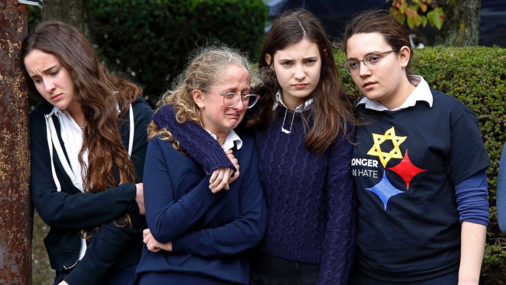 PHOTO: Students from the Yeshiva School of Pittsburgh, pay their respects as the funeral procession for Dr. Jerry Rabinowitz passes their school en route to Homewood Cemetery following a funeral service at the Jewish Community Center, Oct. 30, 2018.