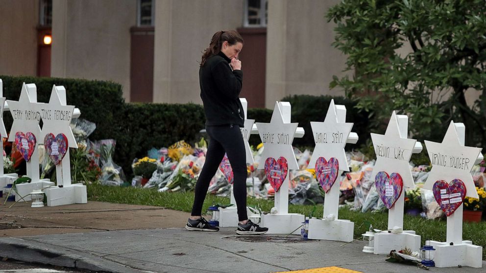 PHOTO: A woman reacts at a makeshift memorial outside the Tree of Life synagogue following Saturday's shooting at the synagogue in Pittsburgh, Penn., Oct. 29, 2018.