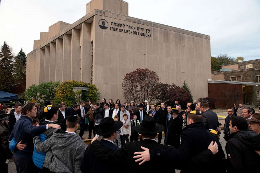 PHOTO: In this Nov. 2, 2018, file photo, members of the Jewish community gather in front of the Tree of Life Synagogue for the Shabbat on Friday evening, in Pittsburgh's Squirrel Hill neighborhood.
