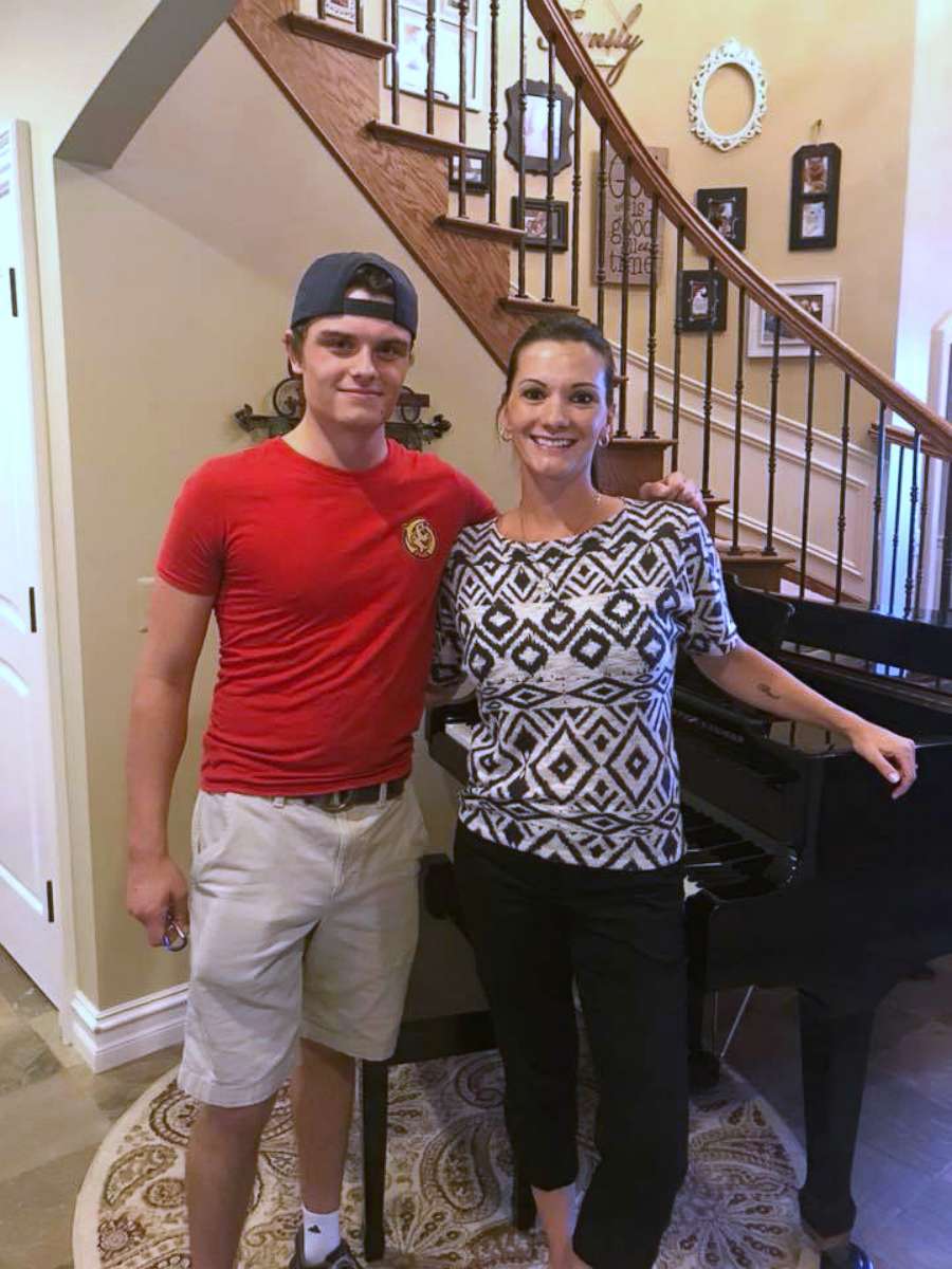 PHOTO: Bryce Dudal, a pizza delivery driver, is pictured with Julie Varchetti in Sterling Heights, Mich.