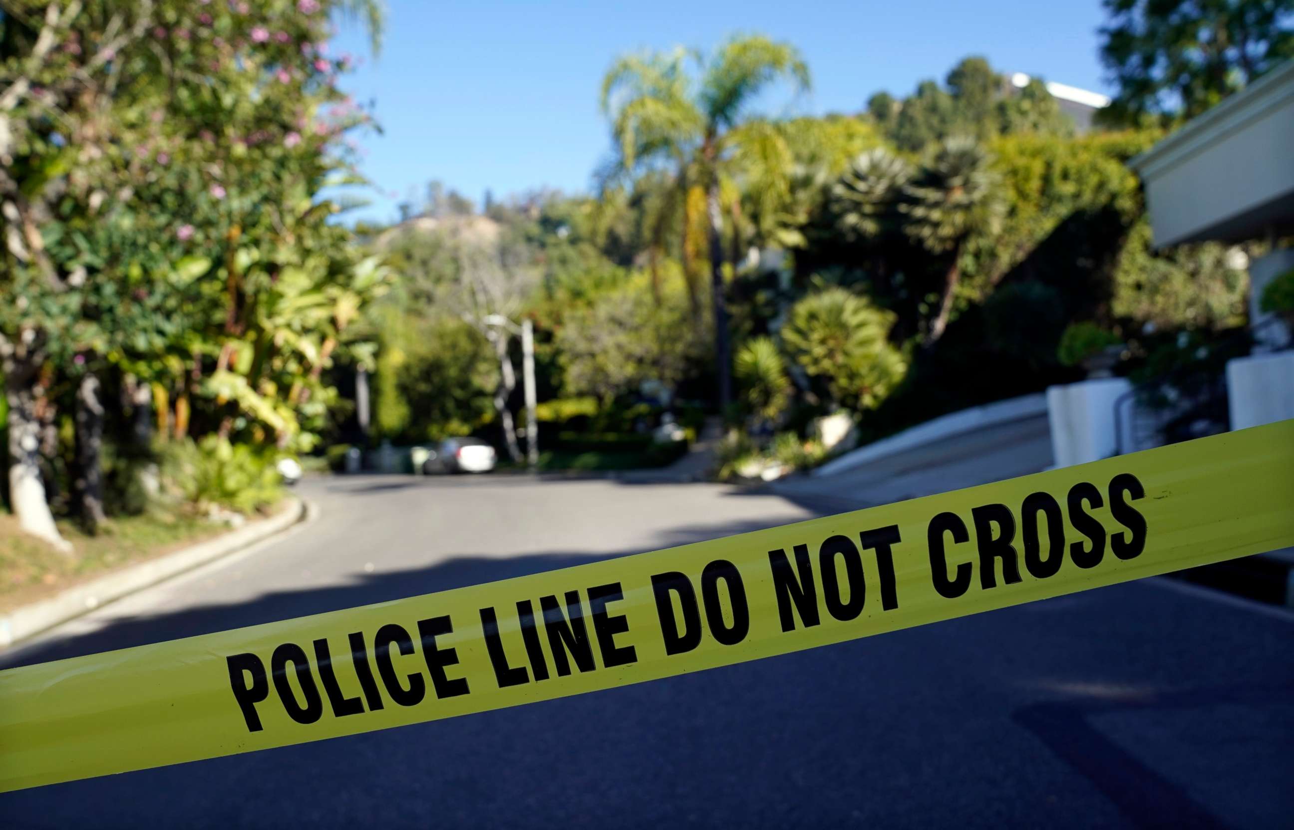 PHOTO: Police tape blocks the intersection of Maytor Place and Barrie Drive in the Trousdale Estates section of Beverly Hills, Calif., Wednesday, Dec. 1, 2021. 
