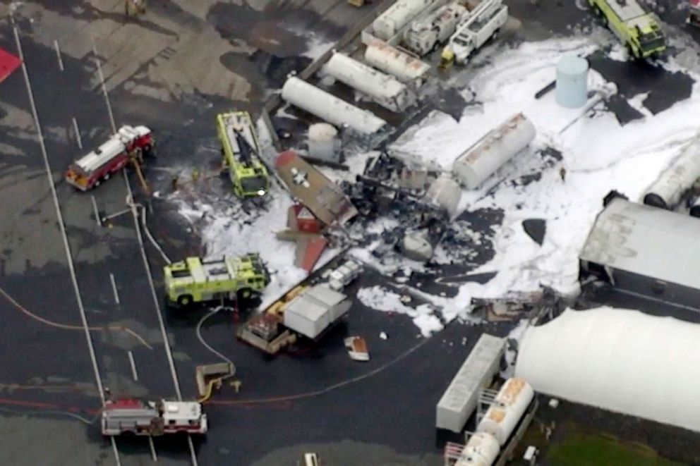 PHOTO: In this aerial image taken from video, emergency crews respond to where a World War II-era bomber B-17 plane crashed at Bradley International Airport in Windsor Locks, Conn., Oct. 2, 2019.