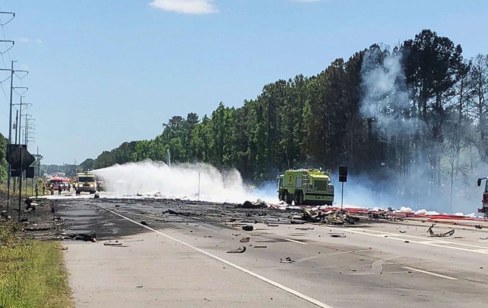 PHOTO: Emergency personnel work at the scene of an Air National Guard C-130 cargo plane that crashed near Savannah, Ga., on May 2, 2018.