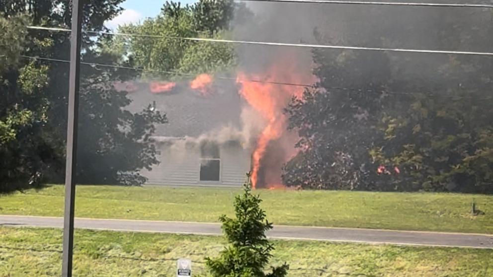 PHOTO: Two people aboard a small plane are dead after the aircraft crashed into a house in Akron, Ohio, causing a fire, authorities said.