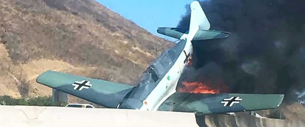 vintage-plane-erupts-in-flames-after-crashing-onto-freeway-in-southern