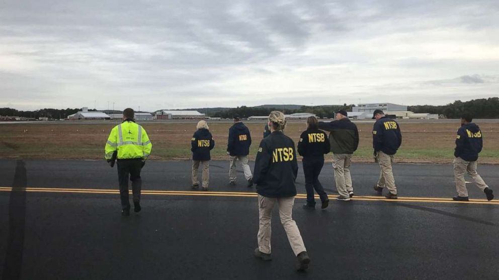 PHOTO: In this photo posted to the NTSB Newsroom Twitter account, NTSB investigators examine ground scars made by a B-17 that crashed at Bradley International Airport in Connecticut, Oct. 2, 2019.