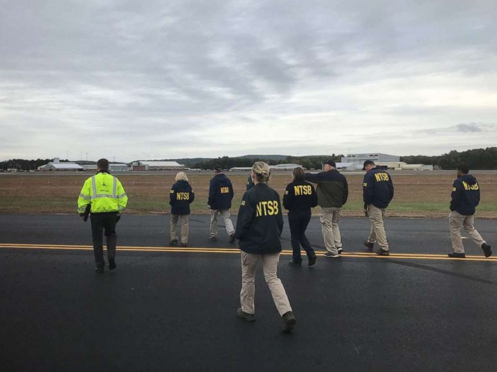 PHOTO: In this photo posted to the NTSB Newsroom Twitter account, NTSB investigators examine ground scars made by a B-17 that crashed at Bradley International Airport in Connecticut, Oct. 2, 2019.