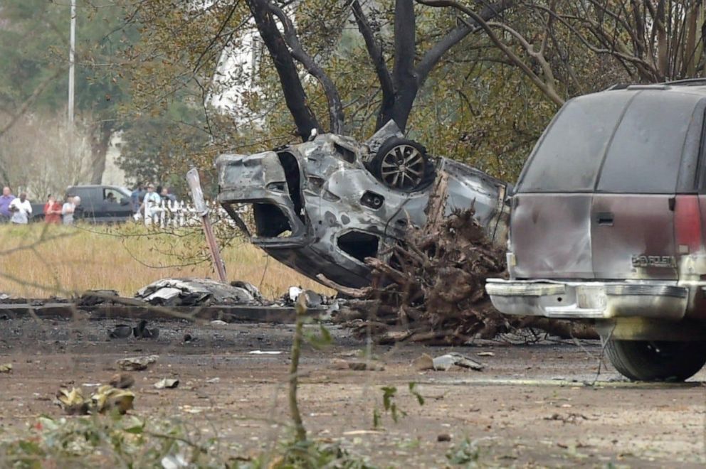 PHOTO: A photo shows a wrecked car which a plane crashed into near Verot School and Feu Follet roads in Lafayette, la., Dec. 28, 2019.