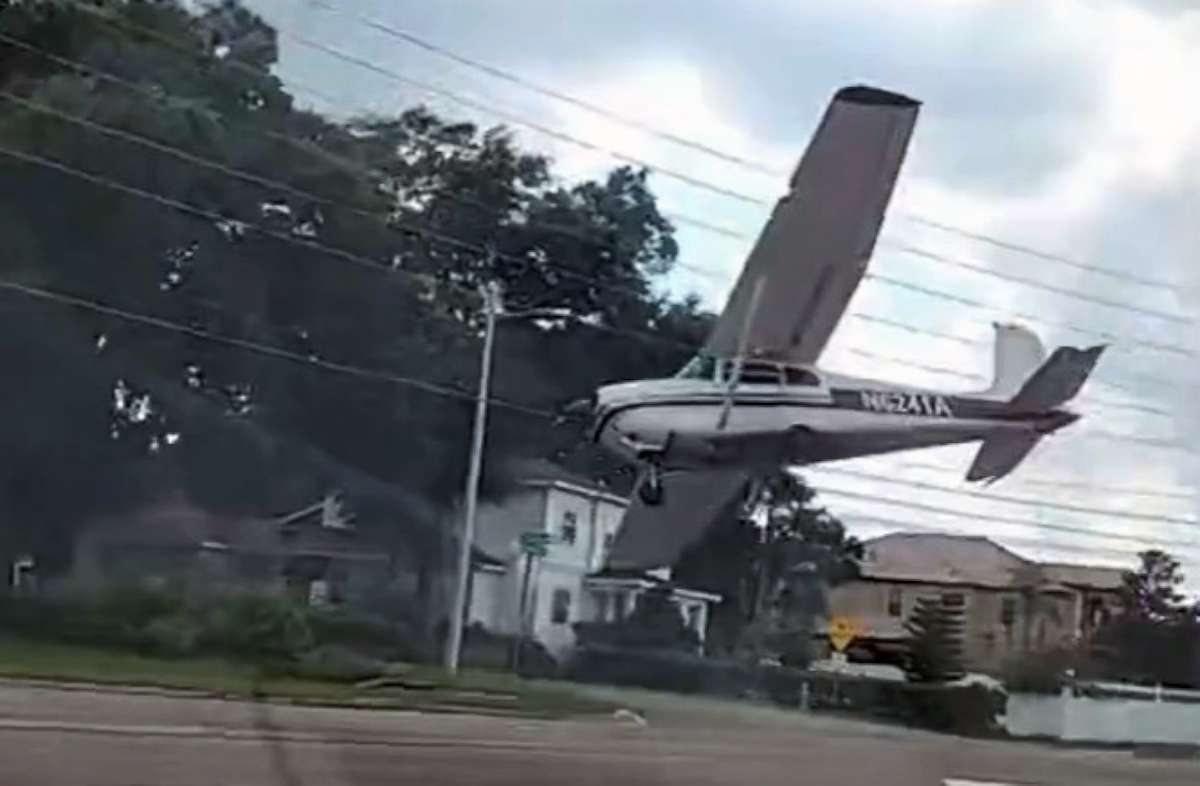 PHOTO: A bystander captured a small plane making an emergency landing on a roadway in Orlando, Fla., Aug. 19, 2022.
