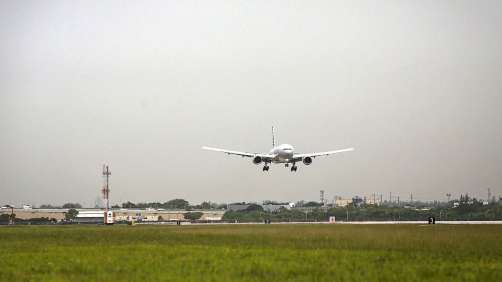 PHOTO: An airplane lands at Miami International Airport, in Miami, June 16, 2021. 