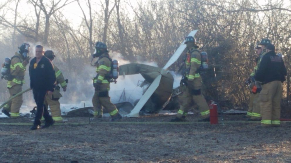 PHOTO: Two people died when a small plane crashed in Kansas on Dec. 31, 2019. Firefighters are seen near the scene.