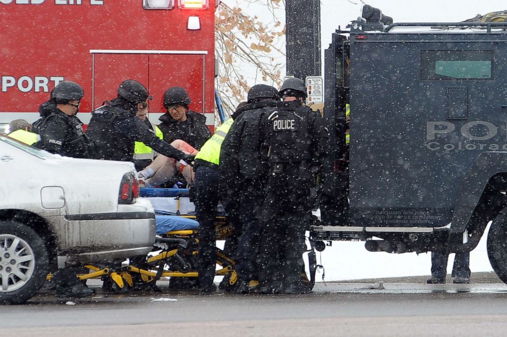 PHOTO: An unidentified victim is transported from the Colorado Springs tactical vehicle to an ambulance after a gunman opened fire at a Planned Parenthood facility on Centennial Boulevard in Colorado Springs, Colo., on Nov. 27, 2015.