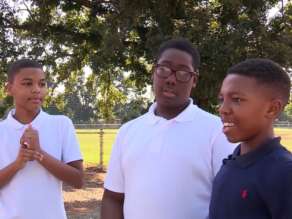 PHOTO: Oklahoma City middle school students Keenan Estell, Damareay Tomlin and Jabaree Williamson turned in $300 they found on a playground near campus.