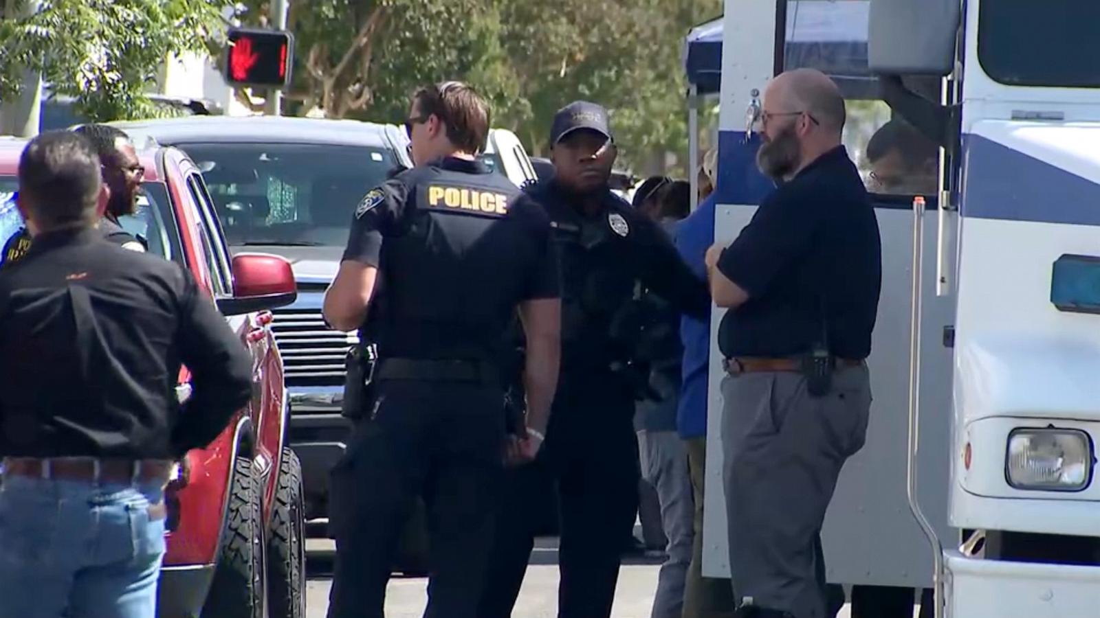 Standoff underway after bomb threat reported at bank: Police