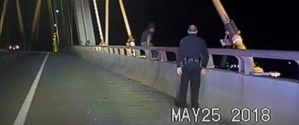 Police snatch woman from the edge of 180-foot Texas bridge known for ...