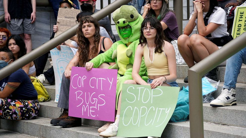 PHOTO: FILE - People protest against the controversial "Cop City" project, outside the city hall in Atlanta, May 15, 2023.