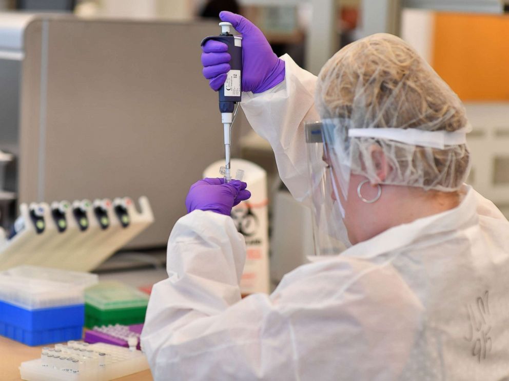 PHOTO: A lab worker transfers solutions from one tube to another at a DNA extraction demonstration at the New York City Office of the Chief Medical Examiner, Sept. 6, 2018, in New York.