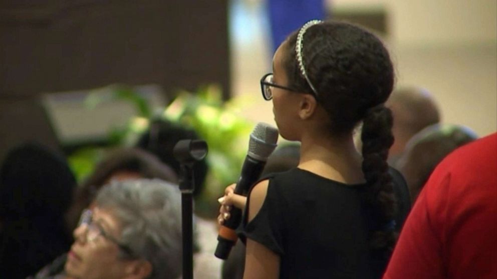 PHOTO: Savannah Taylor, 12, speaks at a community meeting in Phoenix on June 19, 2019, called by the mayor to address a controversial police confrontation with a black family that was caught on viral cell phone video.