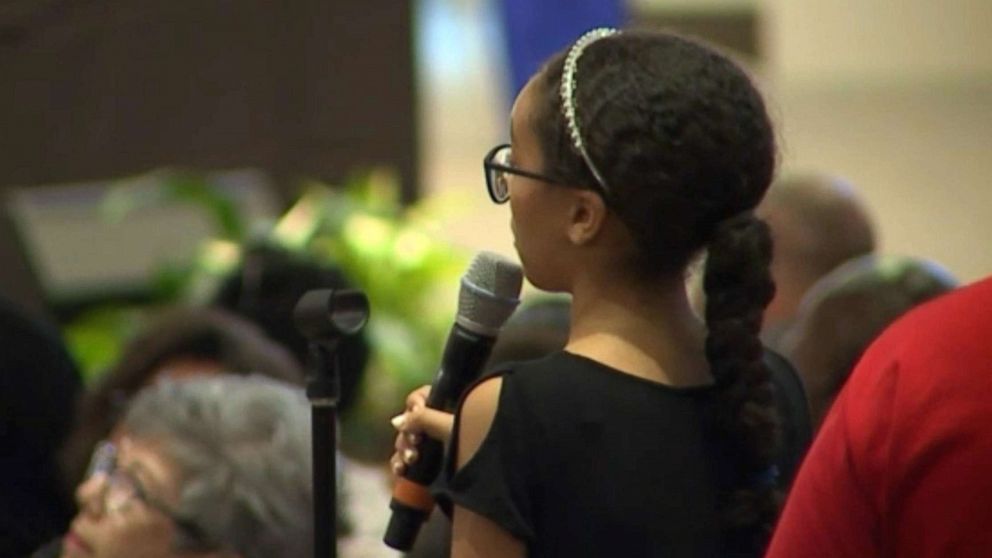 PHOTO: Savannah Taylor, 12, speaks at a community meeting in Phoenix on June 19, 2019, called by the mayor to address a controversial police confrontation with a black family that was caught on viral cell phone video.