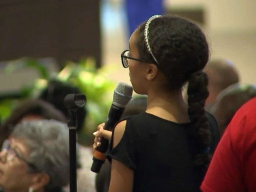 PHOTO: Savannah Taylor, 12, speaks at a community meeting in Phoenix on June 19, 2019, called by the mayor to address a controversial police confrontation with a black family that was caught on viral cell phone video.