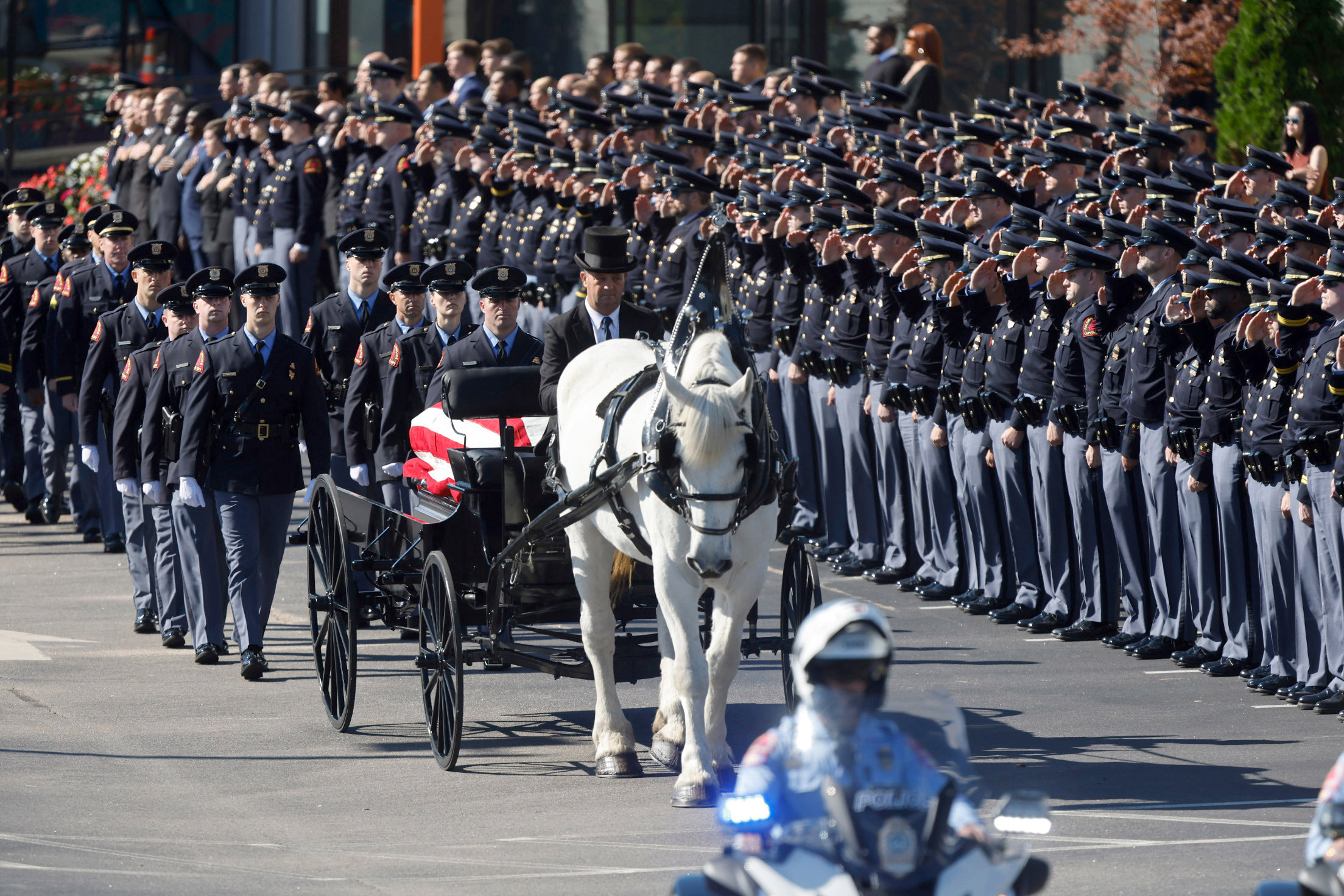 PHOTO: A funeral caisson transports the casket of Raleigh Police Officer Gabriel Torres to Cross Assembly Church in Raleigh, N.C. for his funeral, Oct. 22, 2022.
