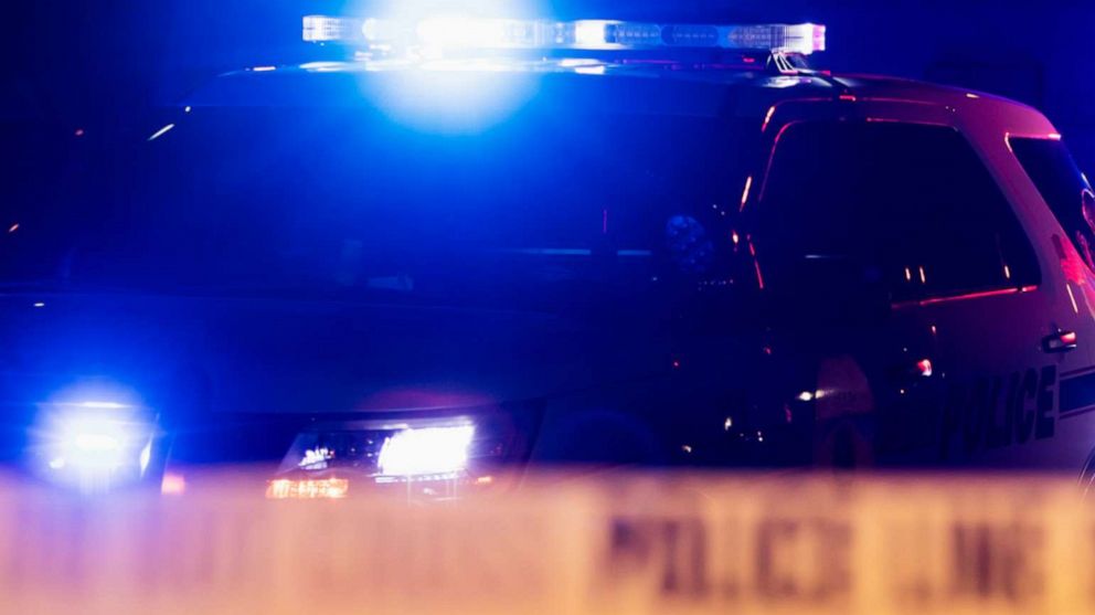 PHOTO: A stock photo show police car lights and crime scene tape.