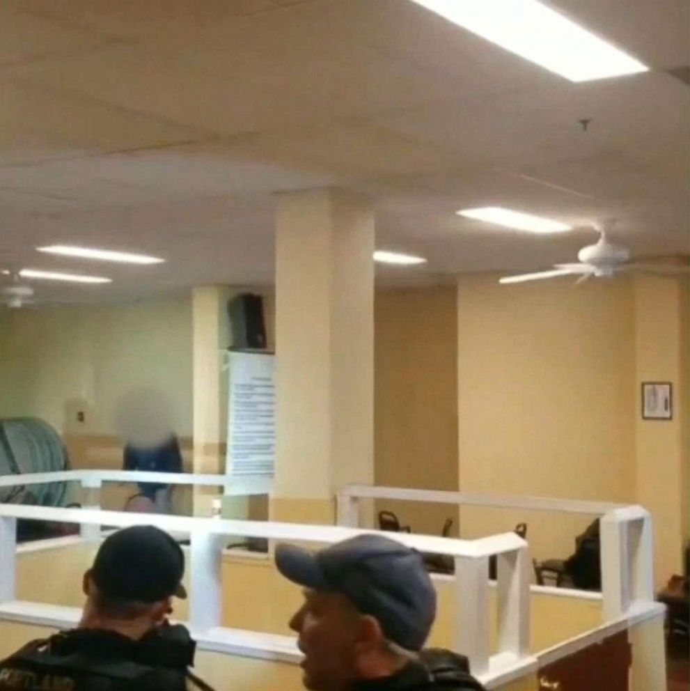 PHOTO: Image from cell phone video of a bystander who witnessed Portland police shooting a suspect who they claim was threatening himself and others with a pocket knife on April 7, 2018 in Portland, Ore.