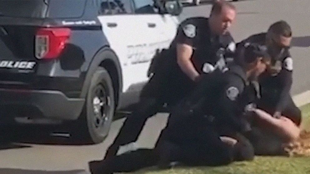 PHOTO: Police officers struggle to subdue a woman during an arrest in an image taken from video by a person on the scene, on April 21, 2021 in Westminster Calif. One of the officers has been placed on leave after video showed him punching the woman.