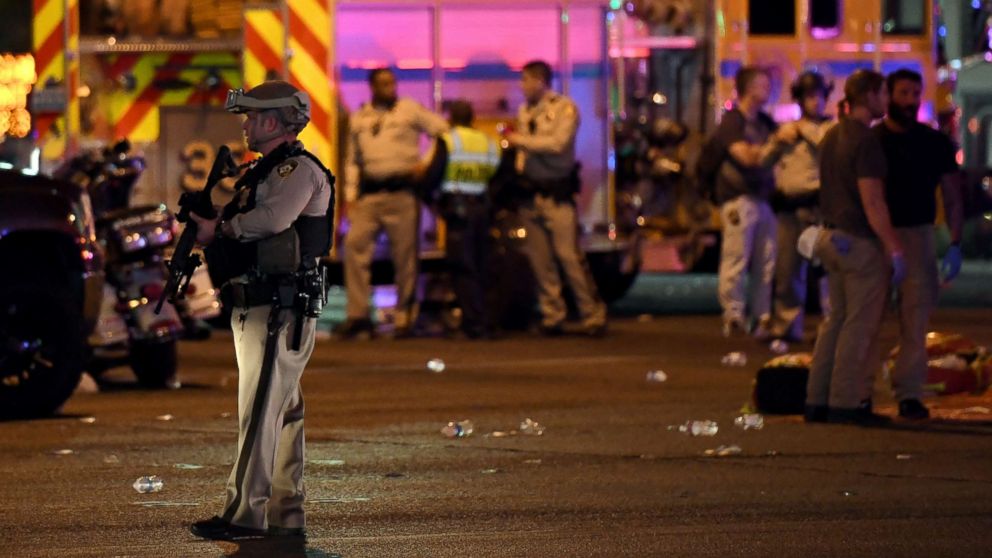 PHOTO: A police officer stands in the intersection of Las Vegas Boulevard and Tropicana Ave. after a mass shooting at a country music festival nearby on Oct. 2, 2017, in Las Vegas. 