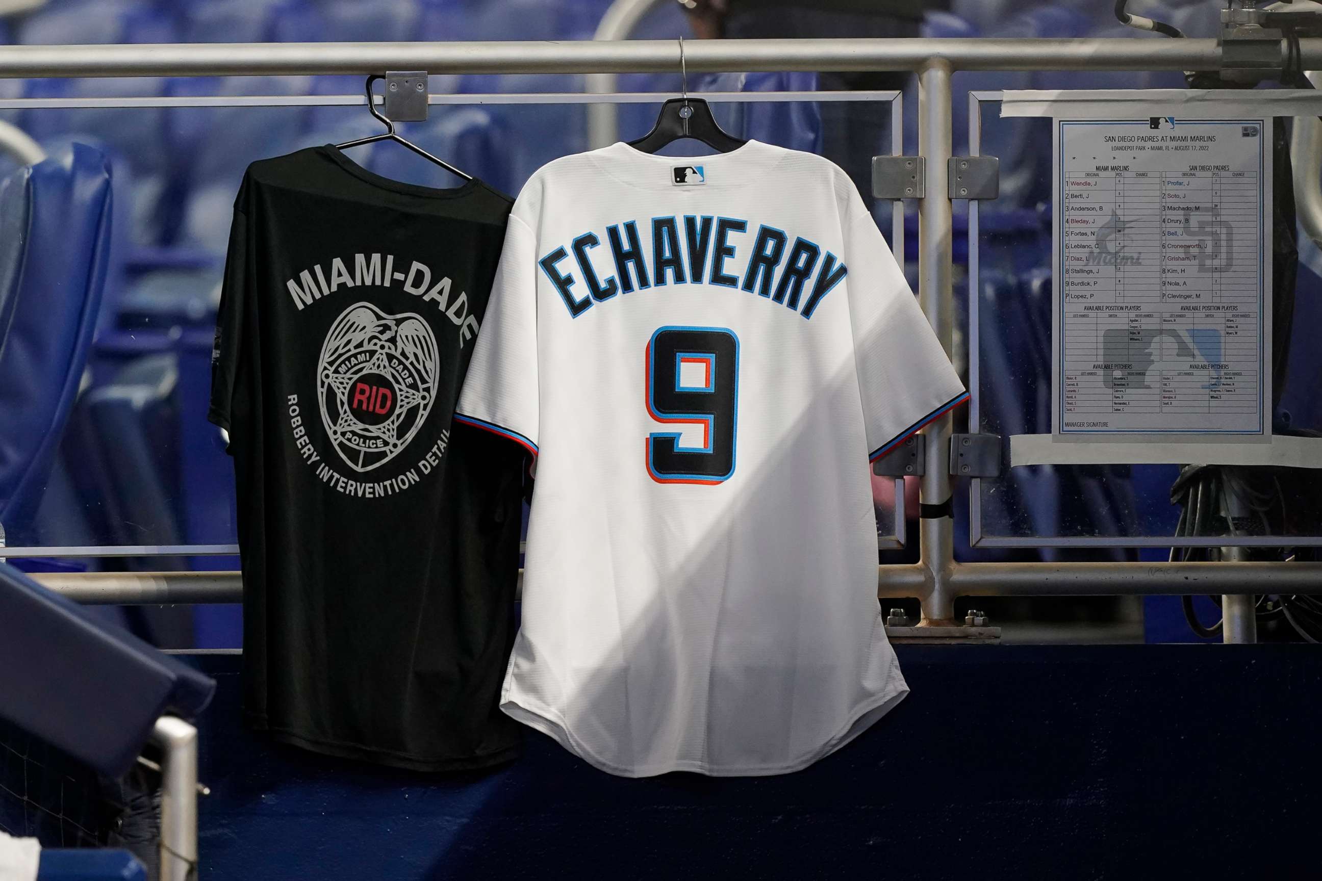PHOTO: The Miami Marlins honor Miami-Dade police detective Cesar Echaverry with a jersey in the team's dugout during a baseball game against the San Diego Padres, Aug. 17, 2022, in Miami.