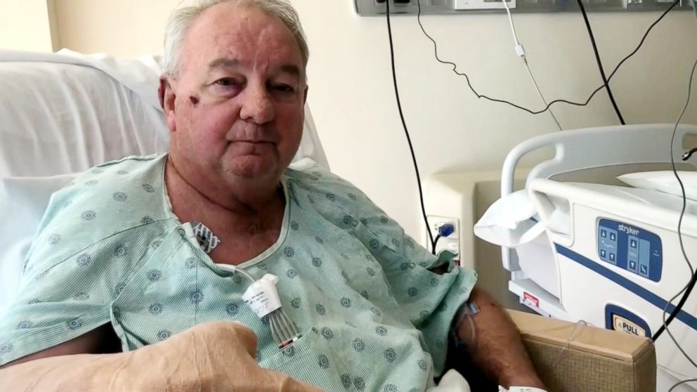 Veteran police officer shot after robbers cornered him and his wife ...