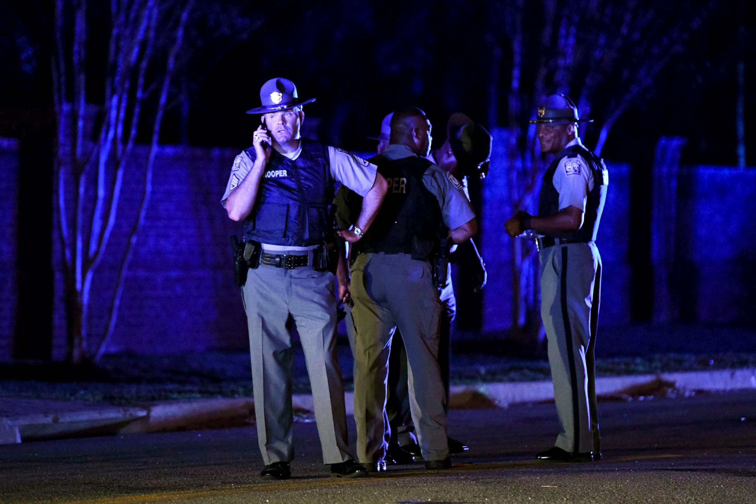 PHOTO: South Carolina state troopers gather near the Vintage Place neighborhood where several law enforcement officers were shot, one fatally, Oct. 3, 2018, in Florence, S.C.