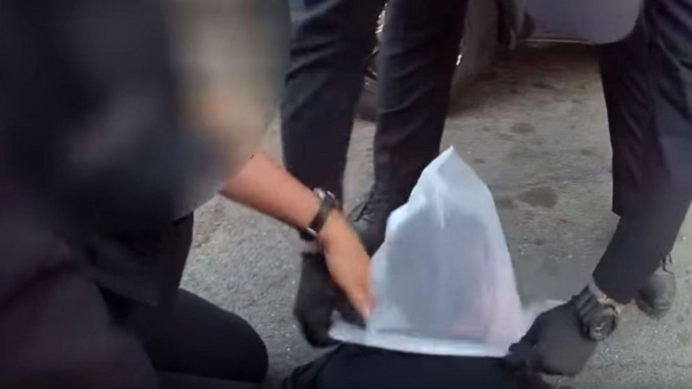 PHOTO: Bodycam video released on May 22, 2019, by the Sacramento, California, Police Department shows putting a spit bag over the head of a handcuffed 12-year-old boy they alleged spit in the face of an officer during an April 28, 2019 arrest.