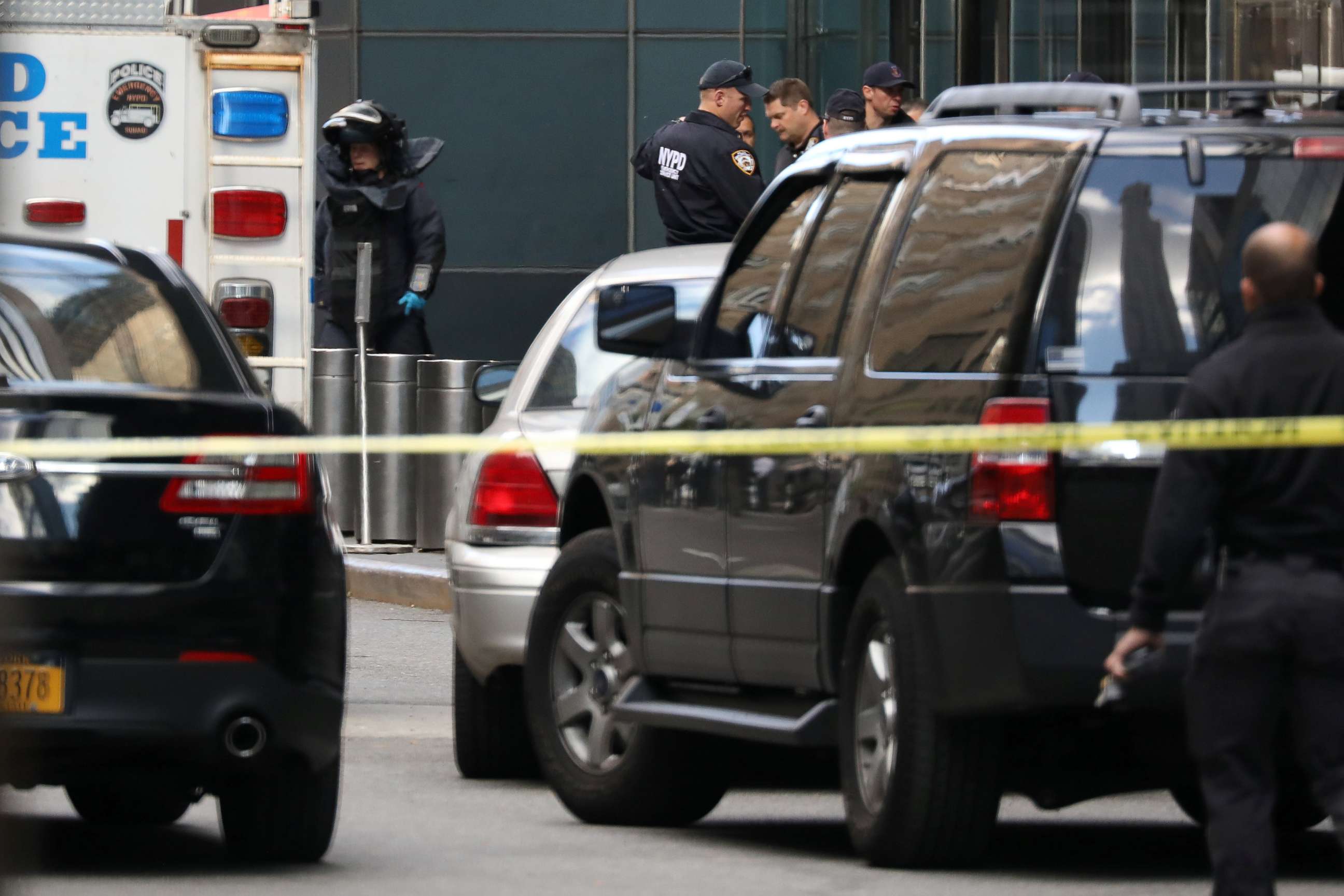 PHOTO: A member of the New York Police Department bomb squad is pictured outside the Time Warner Center in New York City after a suspicious package was found inside the CNN Headquarters.
