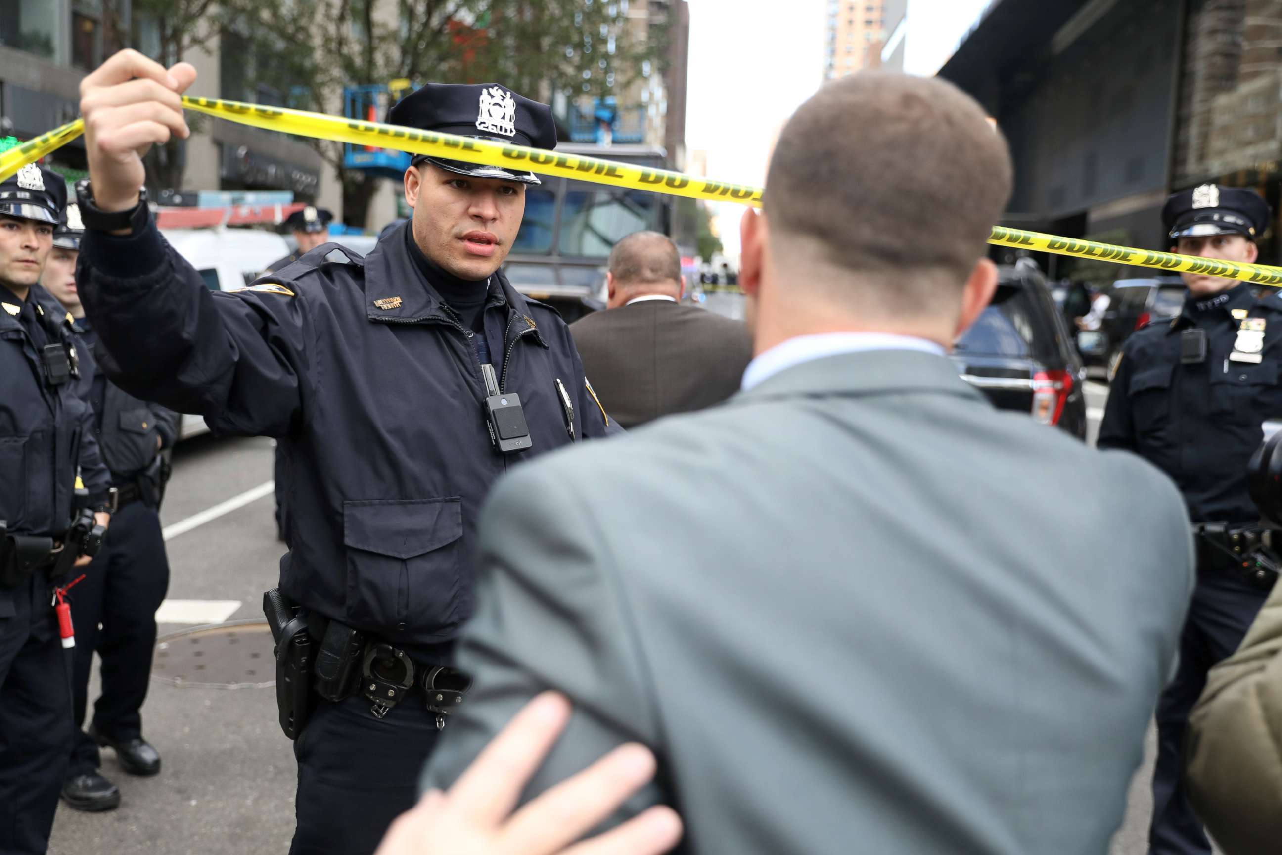 PHOTO: Police allow someone though the perimiter outside the Time Warner Center in the Manhattan borough of New York City after a suspicious package was found inside the CNN Headquarters in New York, Oct. 24, 2018.