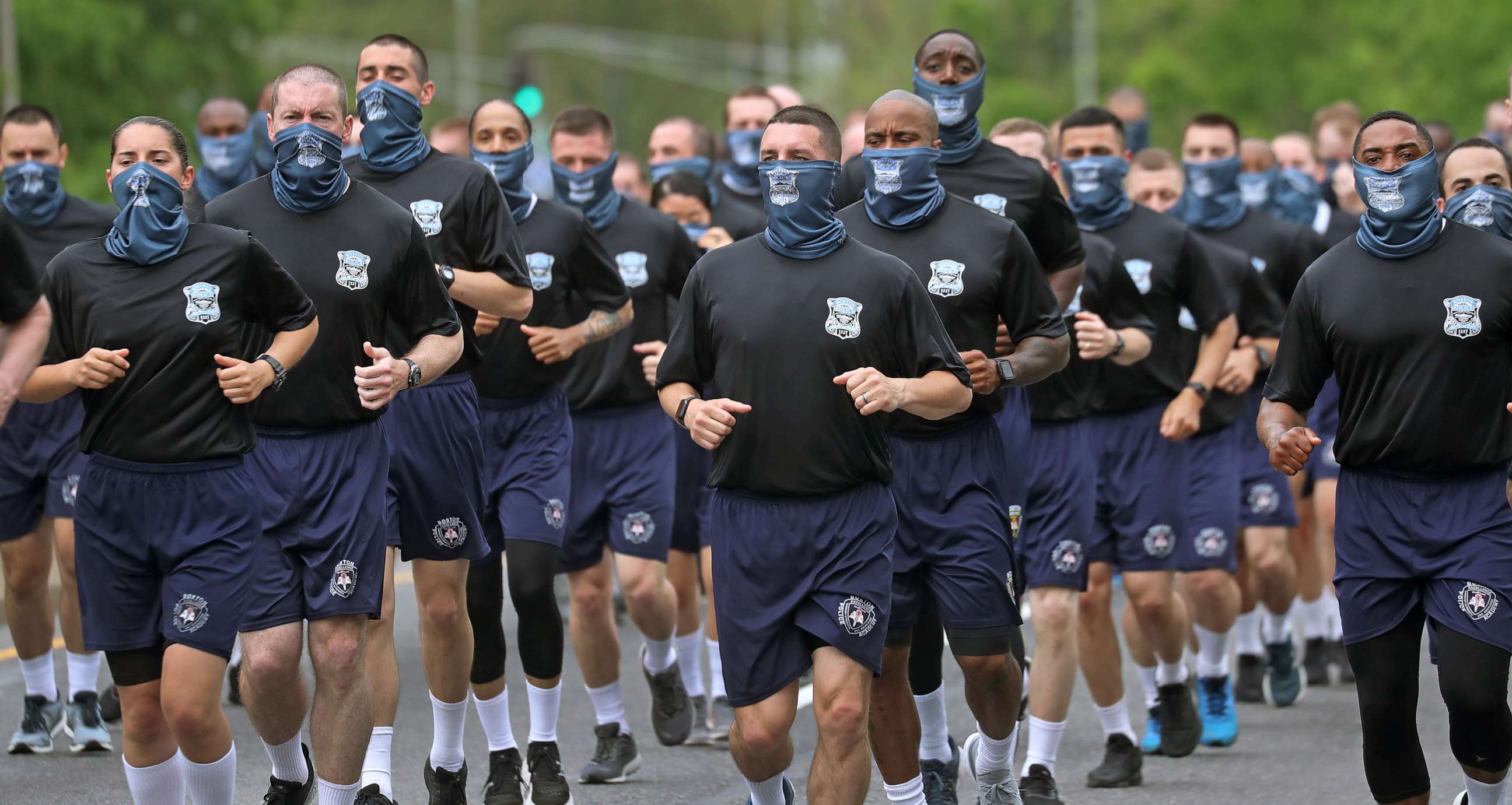 PHOTO: Boston Police recruits run on Columbus Ave, arriving at Boston Police Headquarters, May 29, 2020.