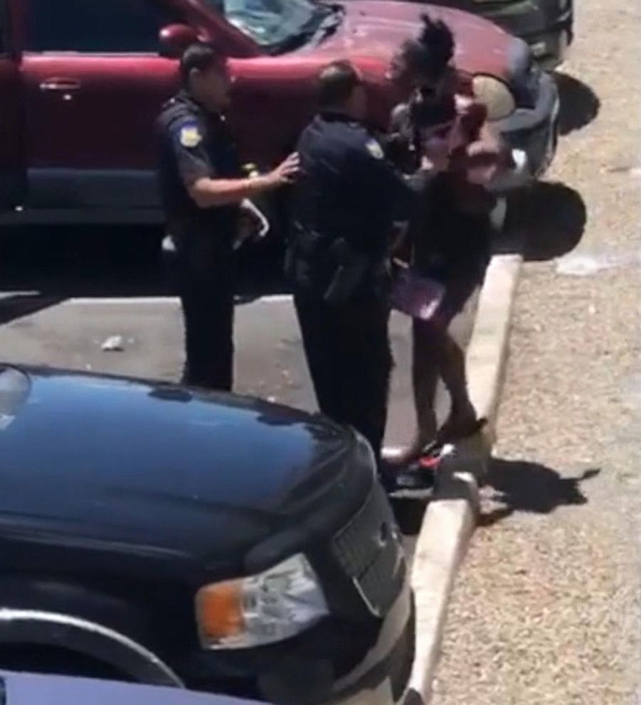 PHOTO: Cellphone video released by police show officers taking two shoplifting suspects into custody in Phoenix, June 11, 2019.