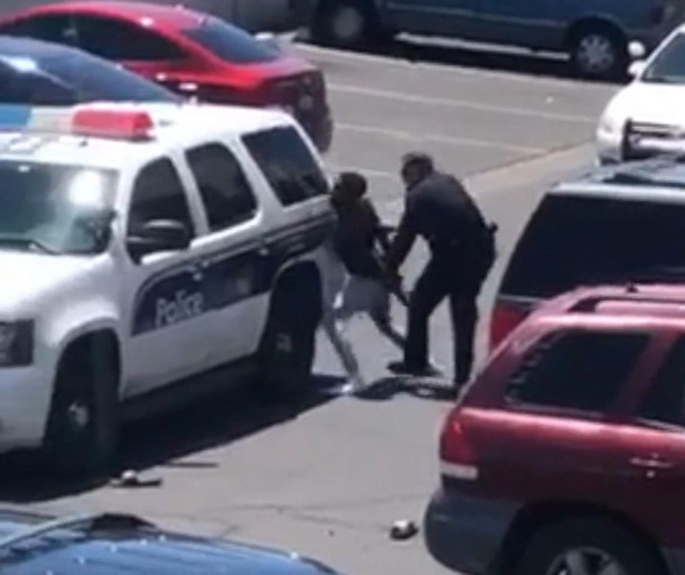 PHOTO: Cellphone video released by police show officers taking two shoplifting suspects into custody in Phoenix, June 11, 2019.