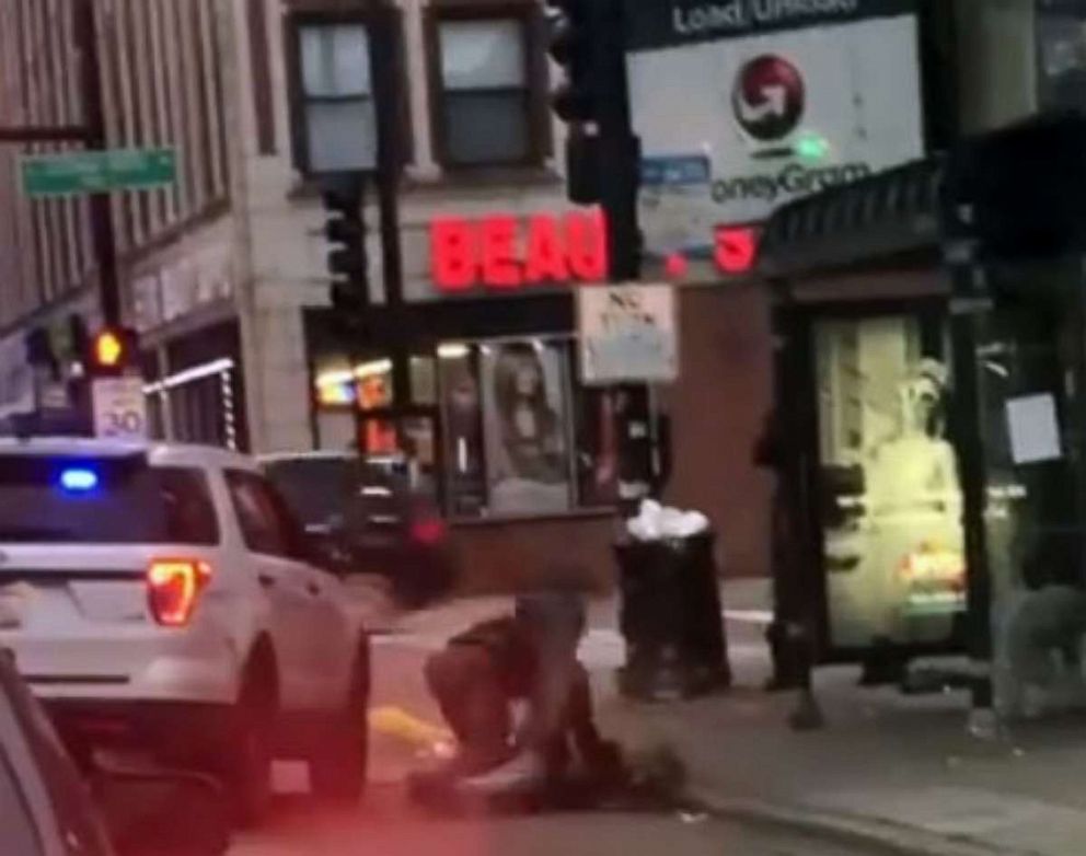 PHOTO: The man did not appear to move after he was thrown to the ground by a Chicago officer on Nov. 29, 2019.