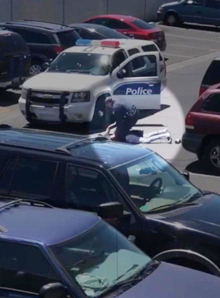 PHOTO: Cellphone video released by police show officers taking two shoplifting suspects into custody in Phoenix, June 11, 2019.