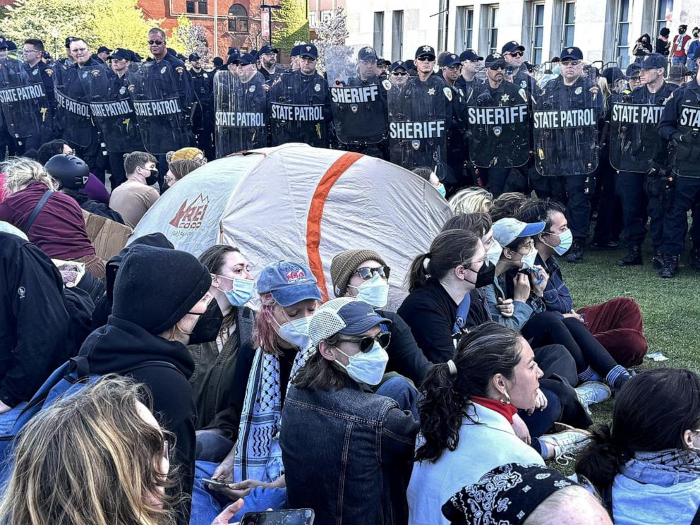 PHOTO: Police face off against pro-Palestinian supporters at an encampment on the Library Mall of the University of Wisconsin, during the ongoing conflict between Israel and the Palestinian Islamist group Hamas, in Madison, Wis., May 1, 2024