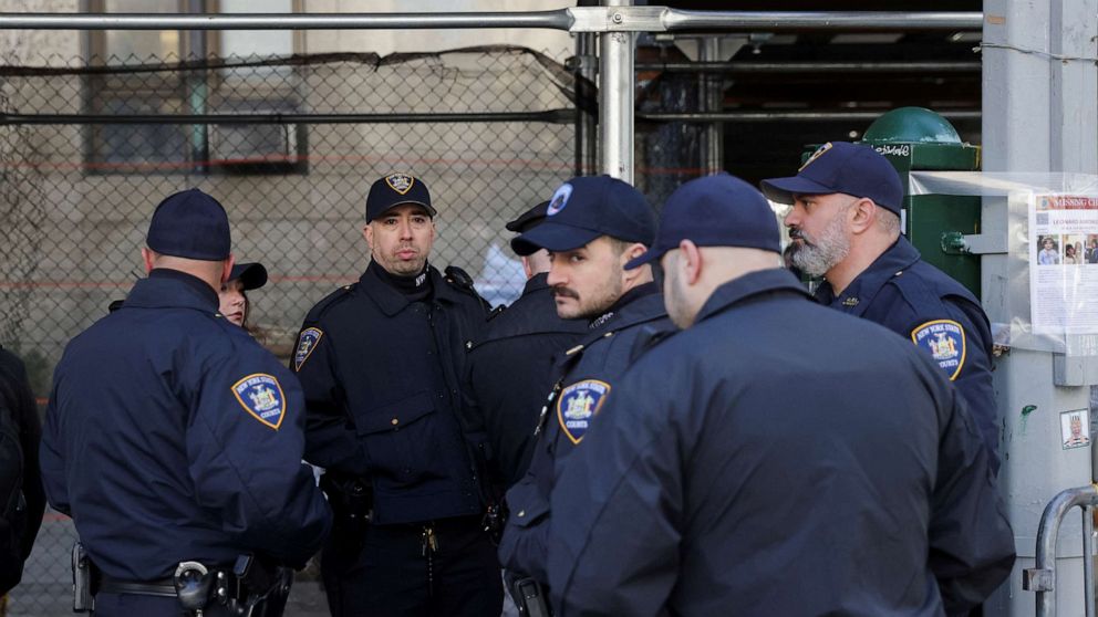 PHOTO: New York police officers stand guard near the Manhattan criminal court, after former President Donald Trump's indictment by a Manhattan grand jury following a probe into hush money paid to porn star Stormy Daniels, in New York City, April 3, 2023.